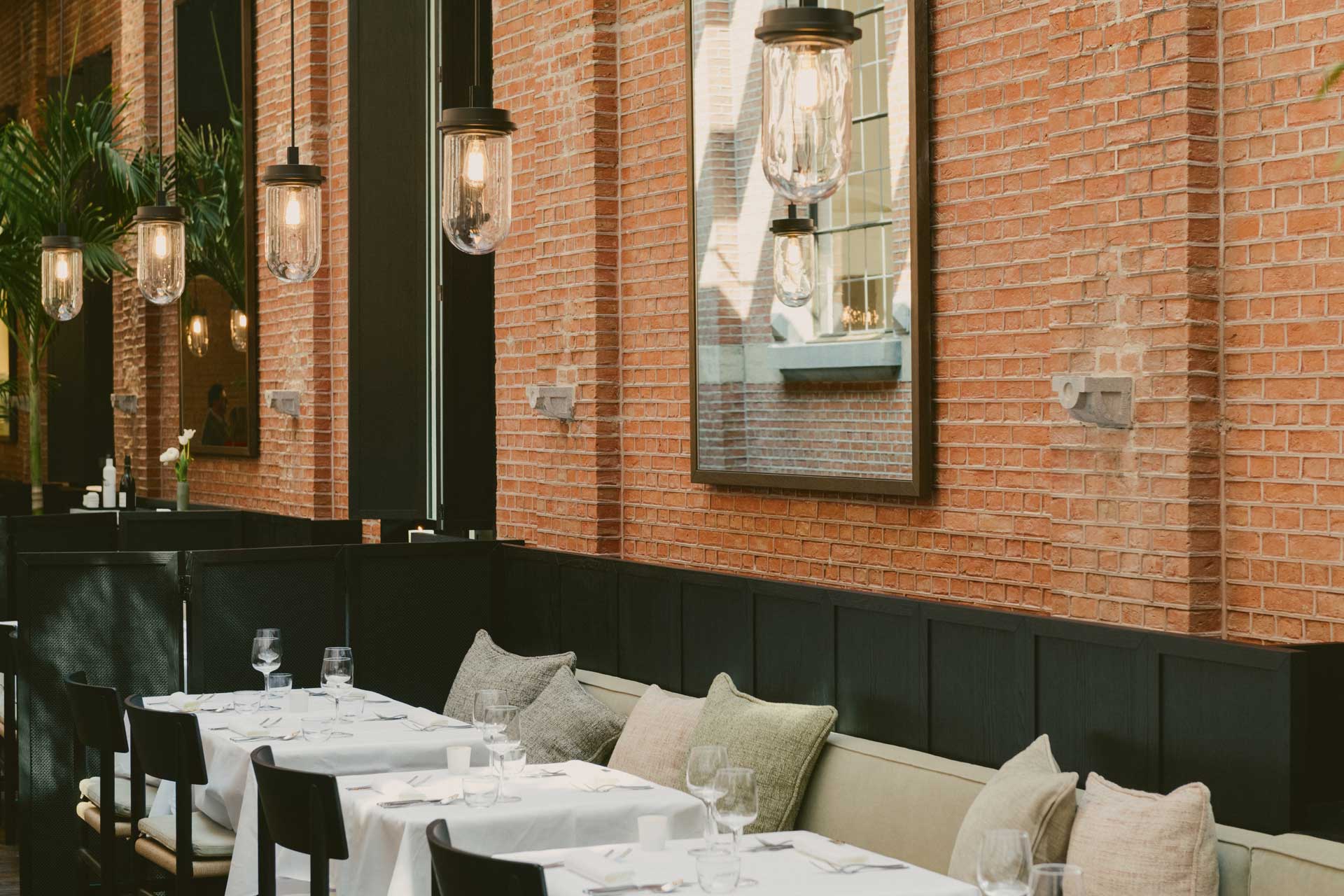 Dining tables laid out for service at the August hotel in Antwerp