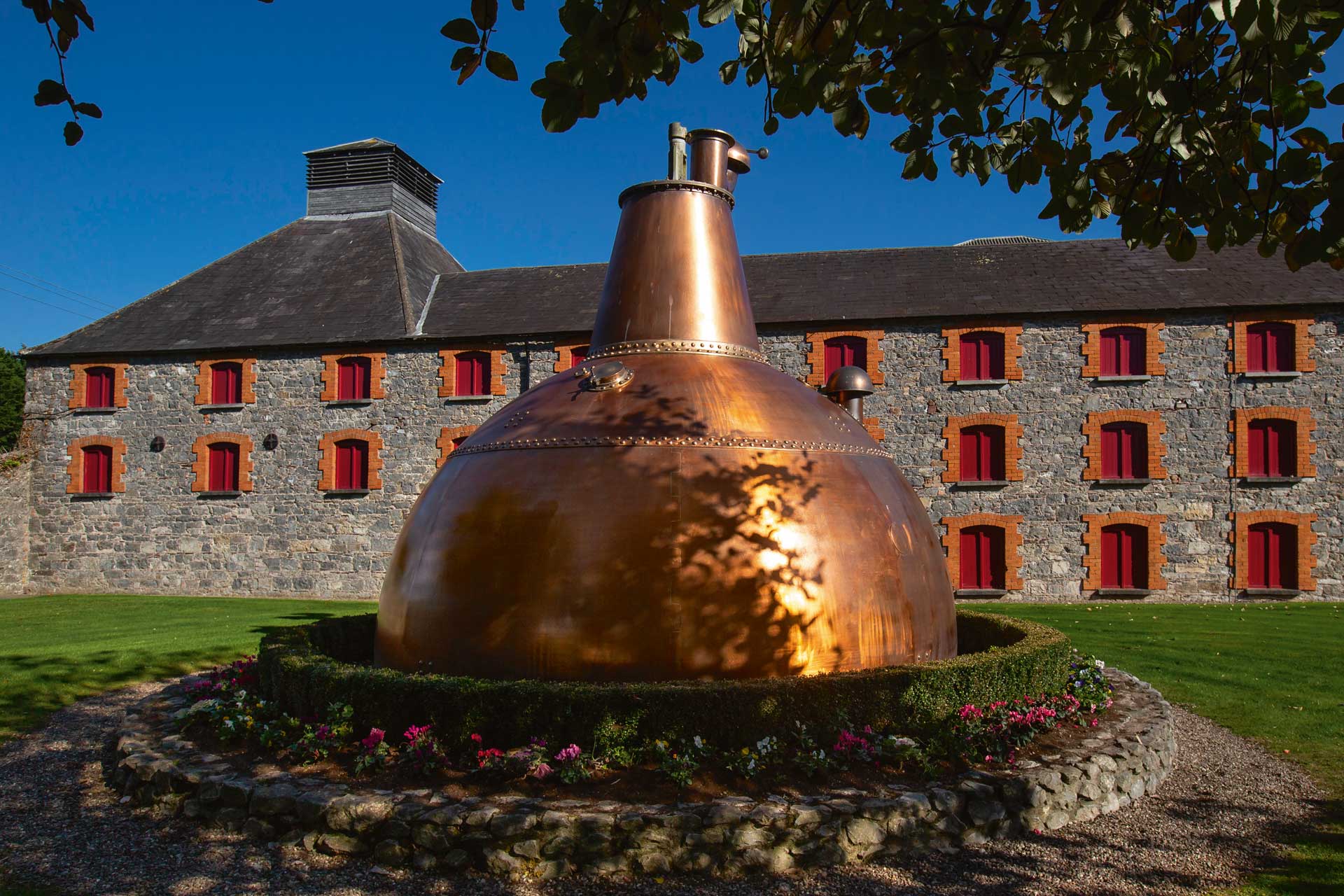 Huge copper pot still outside the old Midleton Distillery