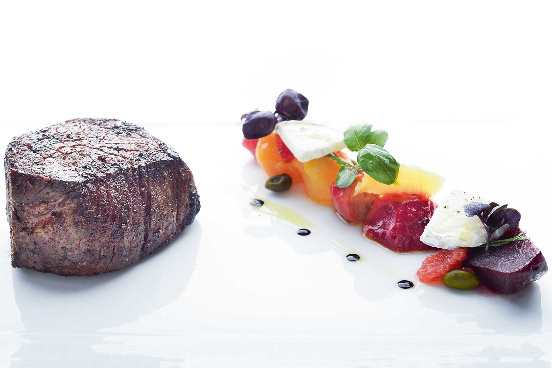Cut's menu at 45 Park Lane offers fillet steak and salad by Wolfgang Puck