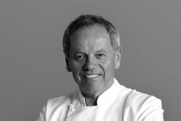 Wolfgang Puck is the chef behind the Spago and Cut restaurant brands