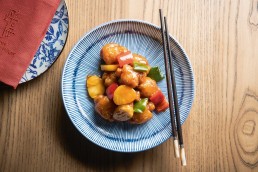 Example dish with chopsticks at The Legacy House restaurant in Hong Kong