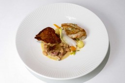 Pan-fried chicken breast with crispy chicken wing by Isaac Griffin